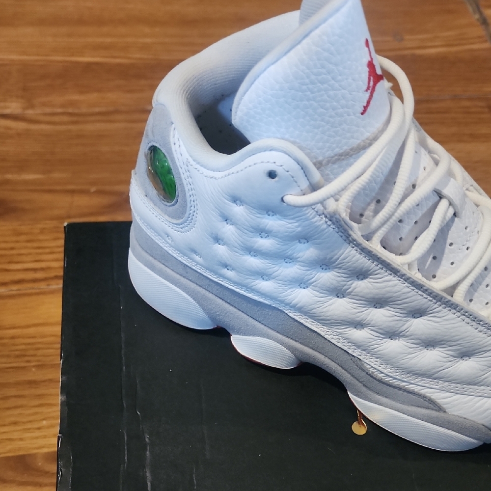 White and Gray Sneakers with Red Logo